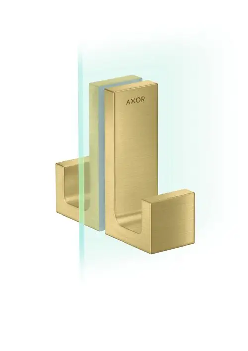 Produkt von AXOR, bestehend aus zwei gebürsteten Messinggriffteilen, die eine Glasduschtür halten. Klare Linien und geometrische Formgebung.